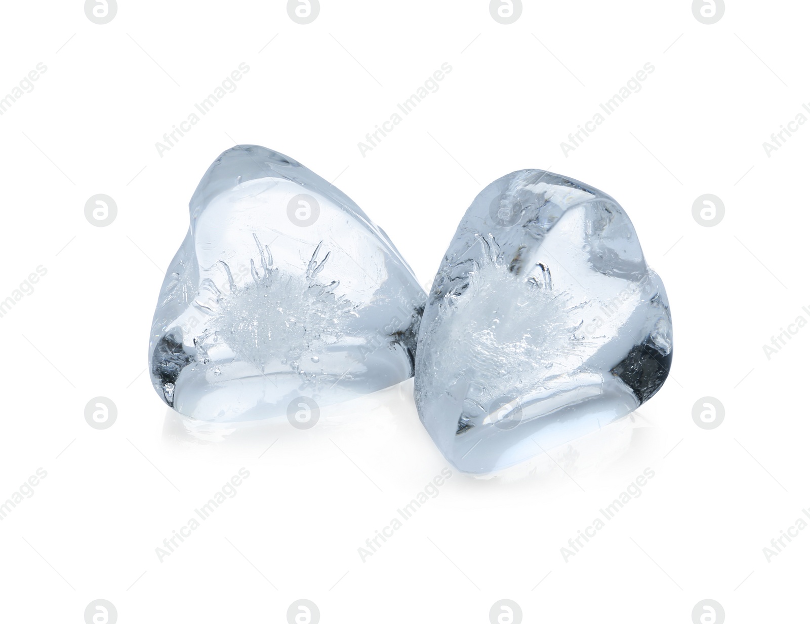 Photo of Heart shaped ice cubes on white background