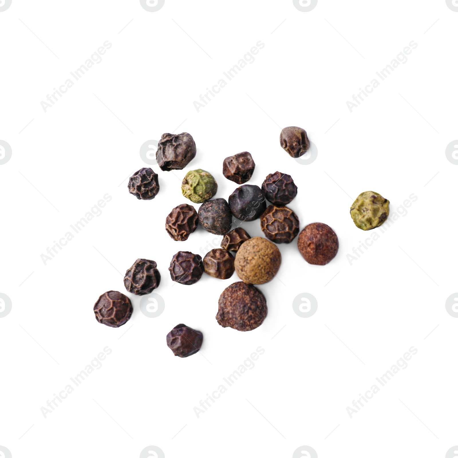 Photo of Heap of mixed peppercorns isolated on white, top view