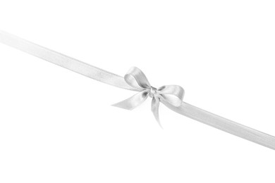 Image of White satin ribbon with bow isolated on white