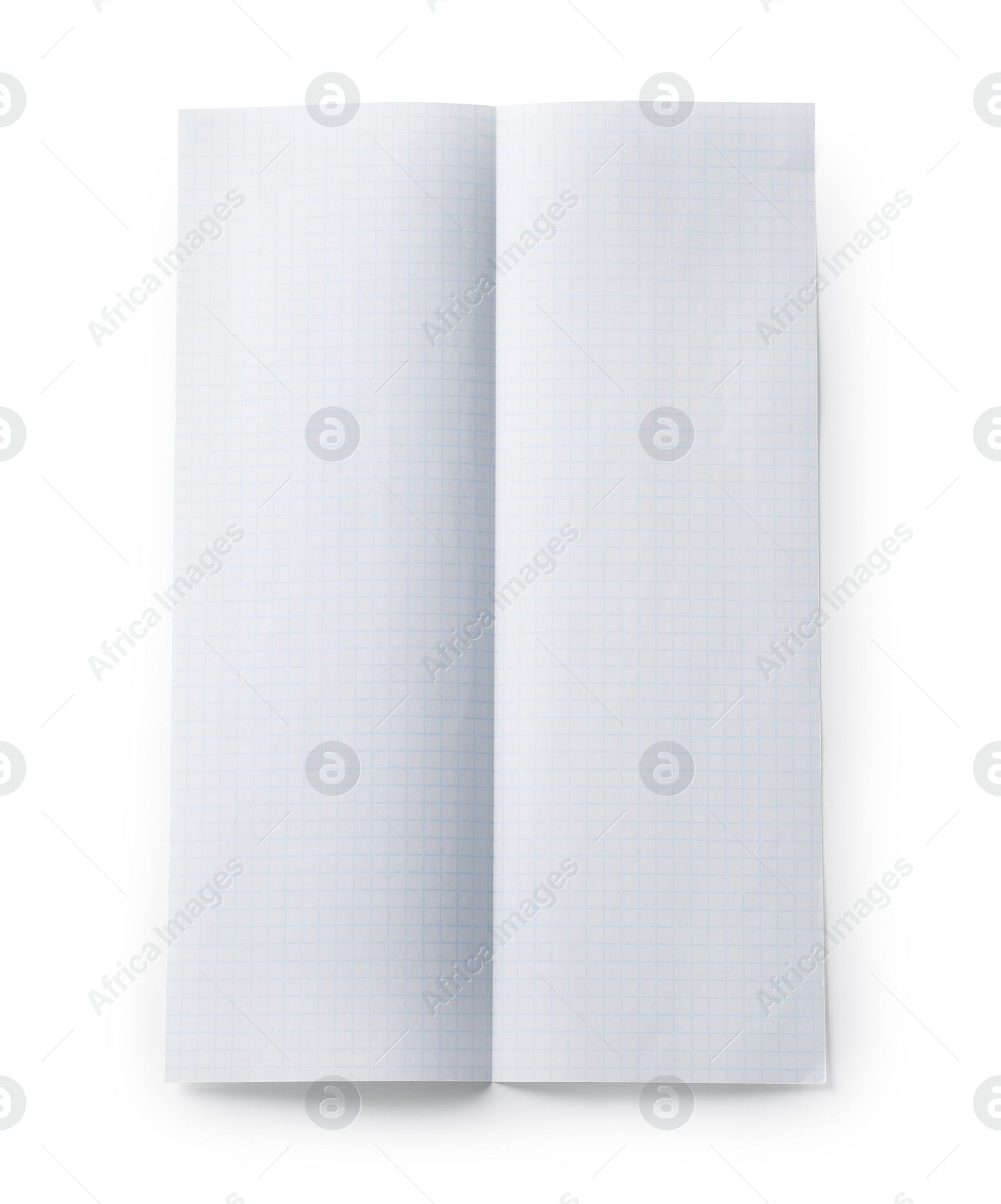 Photo of Checkered sheet of paper with crease on white background, top view