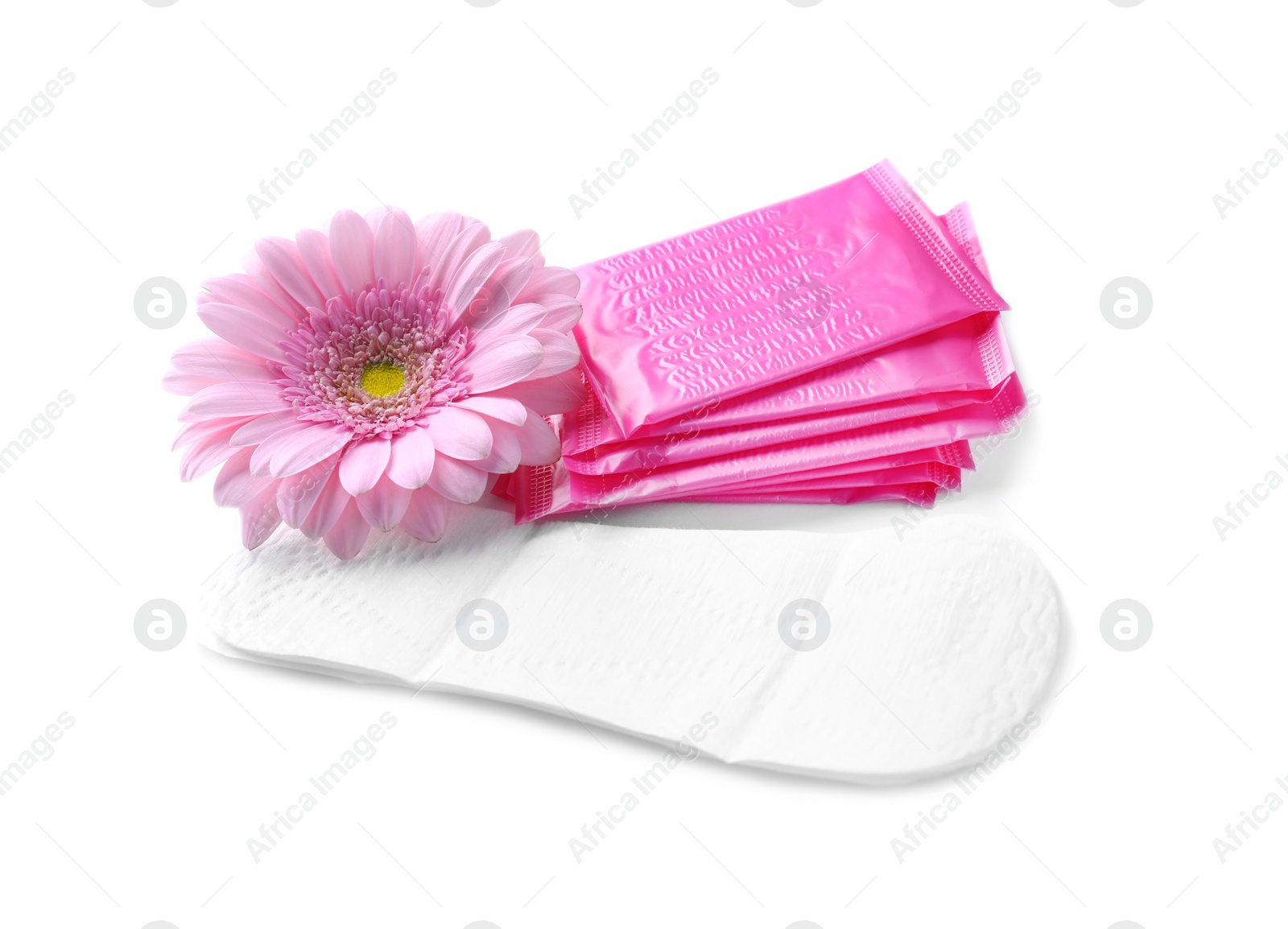 Photo of Menstrual pads and flower on white background. Gynecological care