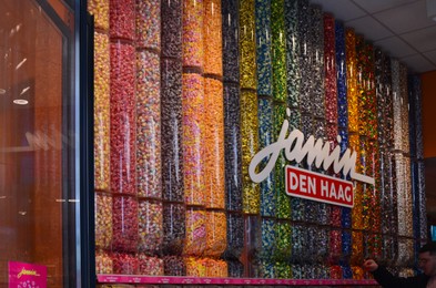 Photo of Hague, Netherlands - May 2, 2022: Many colorful sweets in Jamin candy store