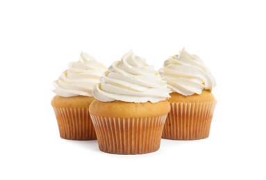 Photo of Delicious cupcakes decorated with cream on white background