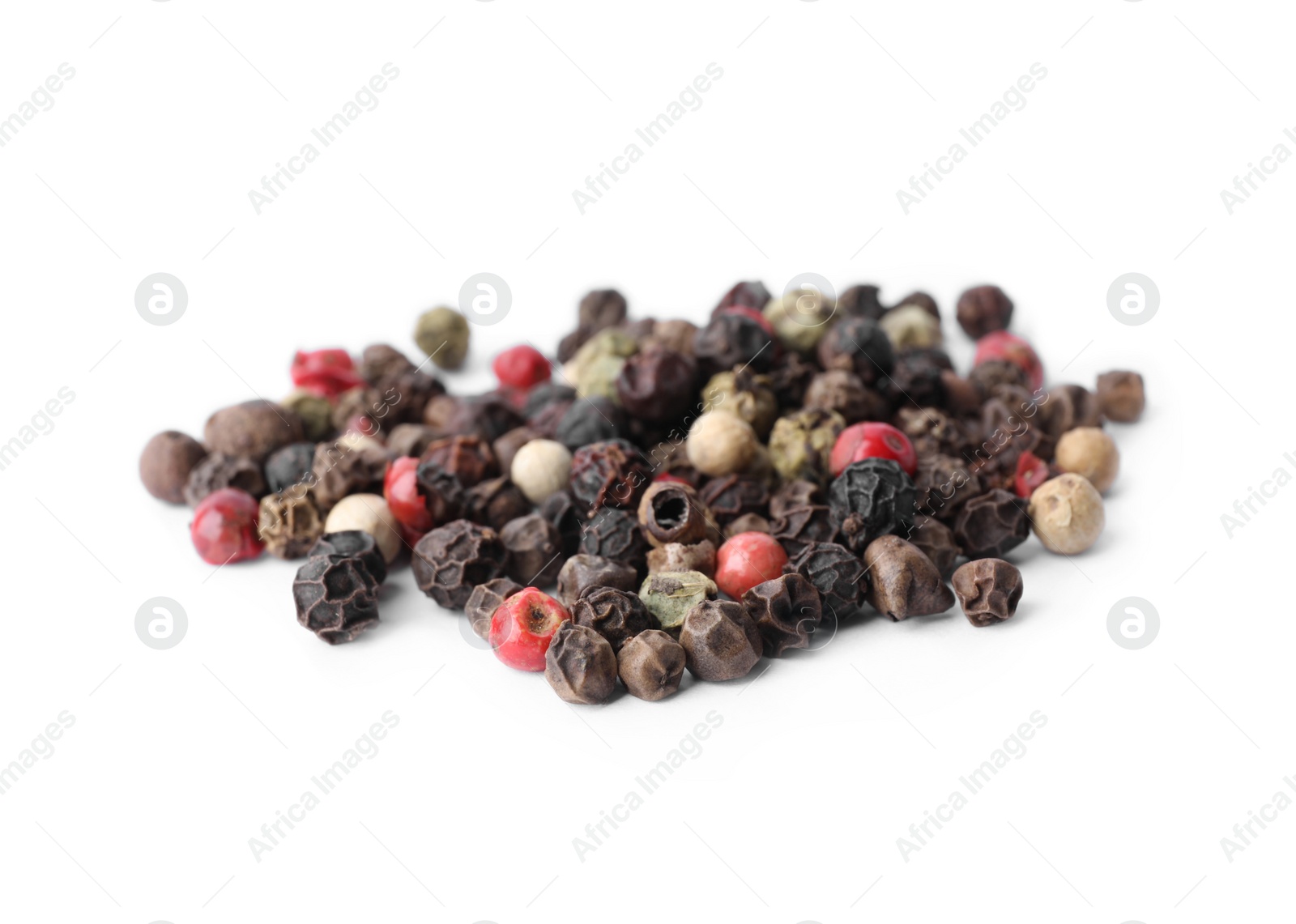 Photo of Mix of different pepper grains isolated on white