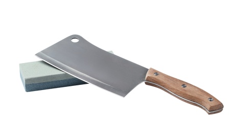 Photo of Sharp cleaver knife and grindstone isolated on white