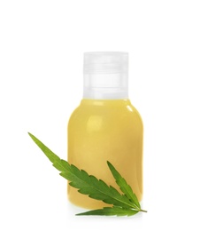 Bottle with hemp lotion on white background