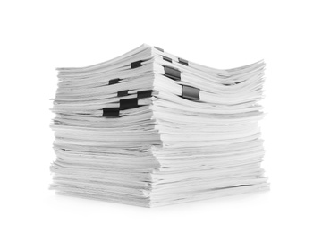 Stack of documents with black clips on white background