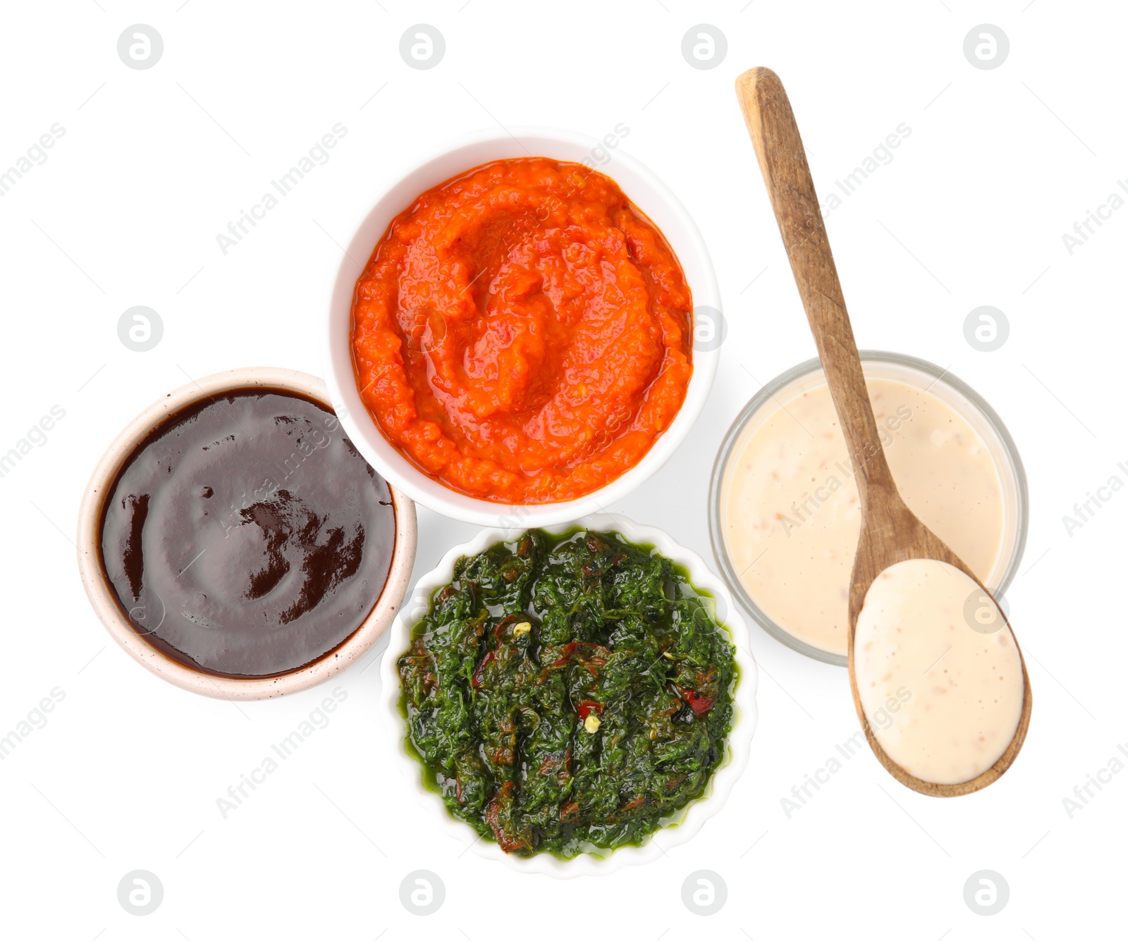 Photo of Different marinades isolated on white, top view