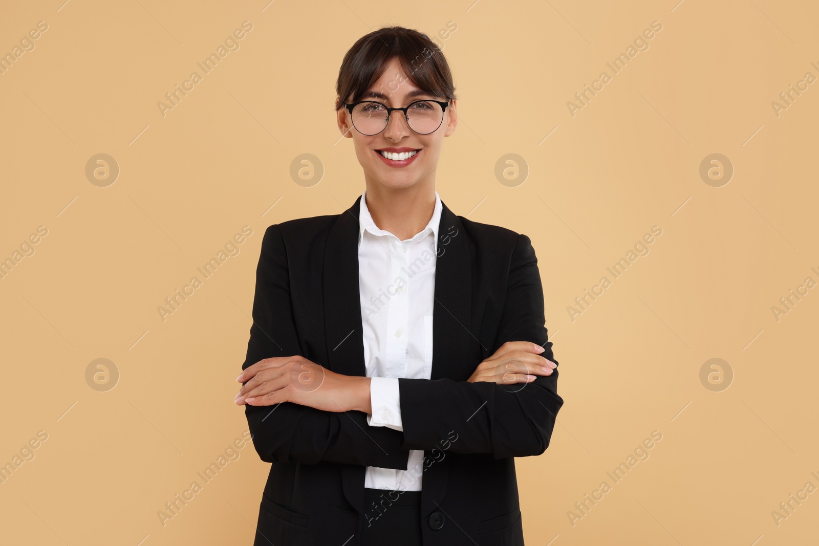 Photo of Portrait of happy secretary on beige background