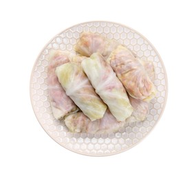 Plate with uncooked stuffed cabbage rolls isolated on white, top view