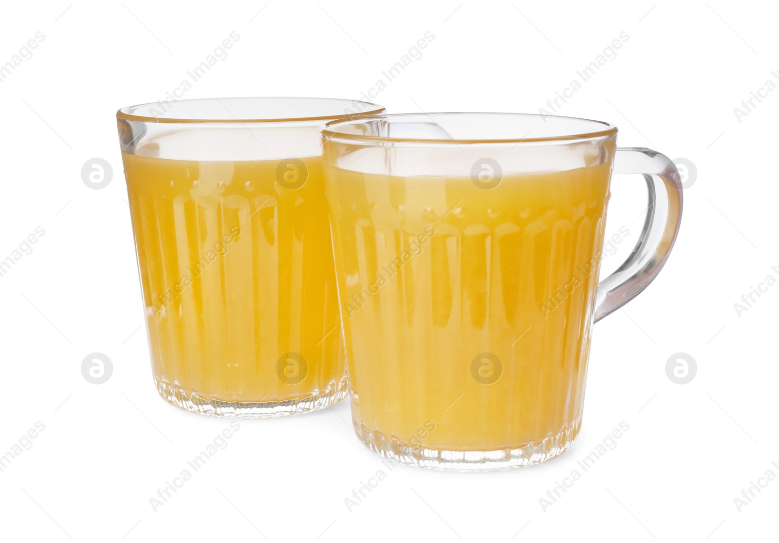 Photo of Immunity boosting drink in two glass cups on white background