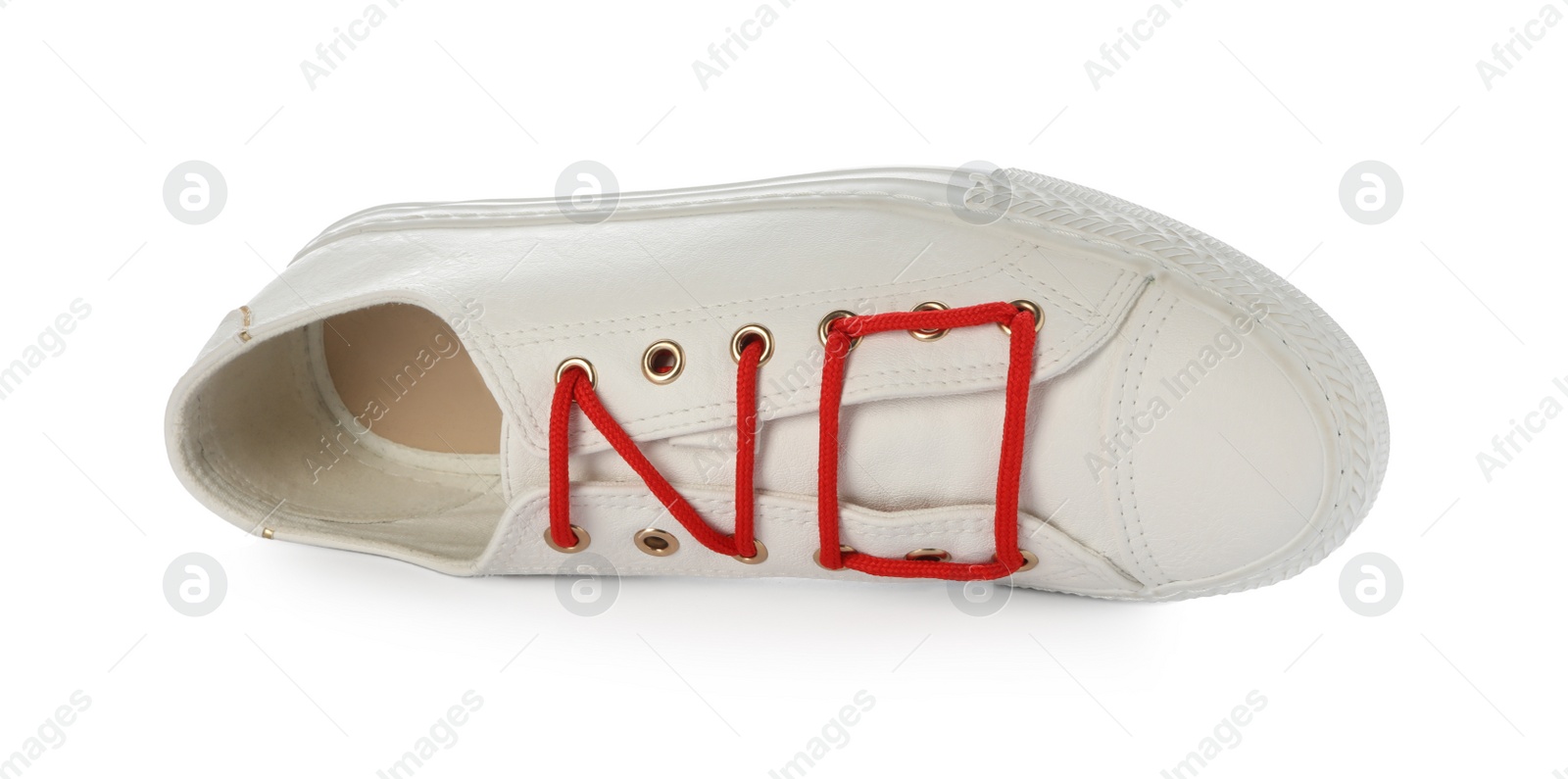 Photo of Stylish shoe with red laces on white background