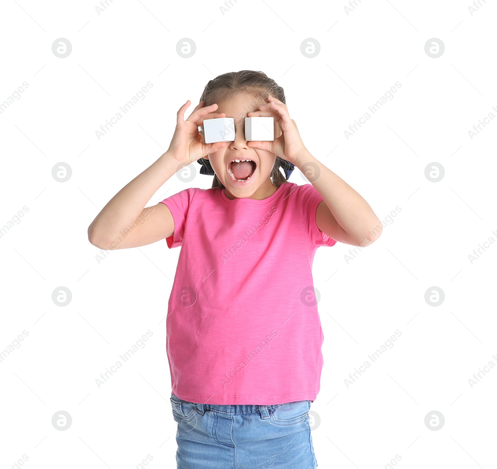 Photo of Cute little child playing with cubes on white background