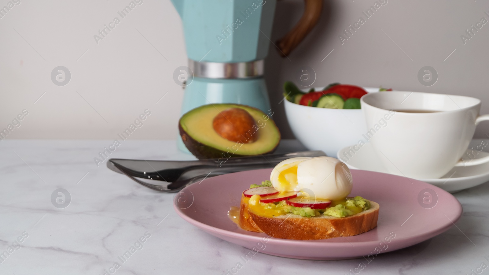 Photo of Tasty sandwich with boiled egg and radish served on white marble table, space for text