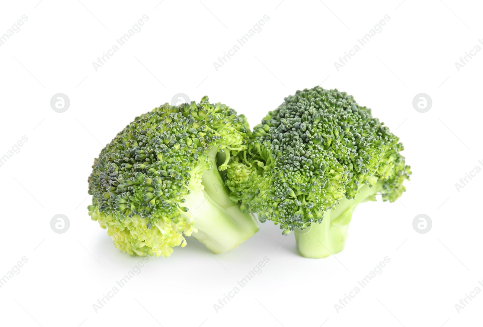 Photo of Fresh green broccoli on white background. Organic food