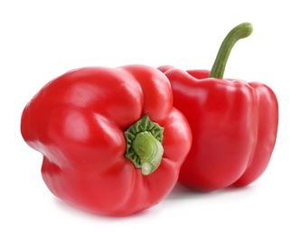 Ripe red bell peppers isolated on white