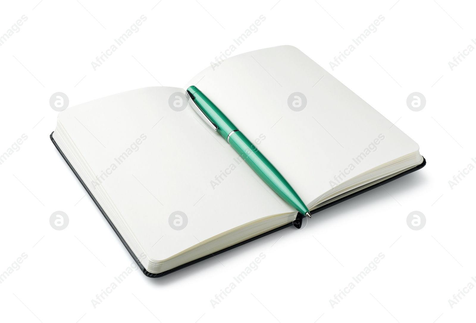 Photo of Open notebook with blank pages and pen isolated on white