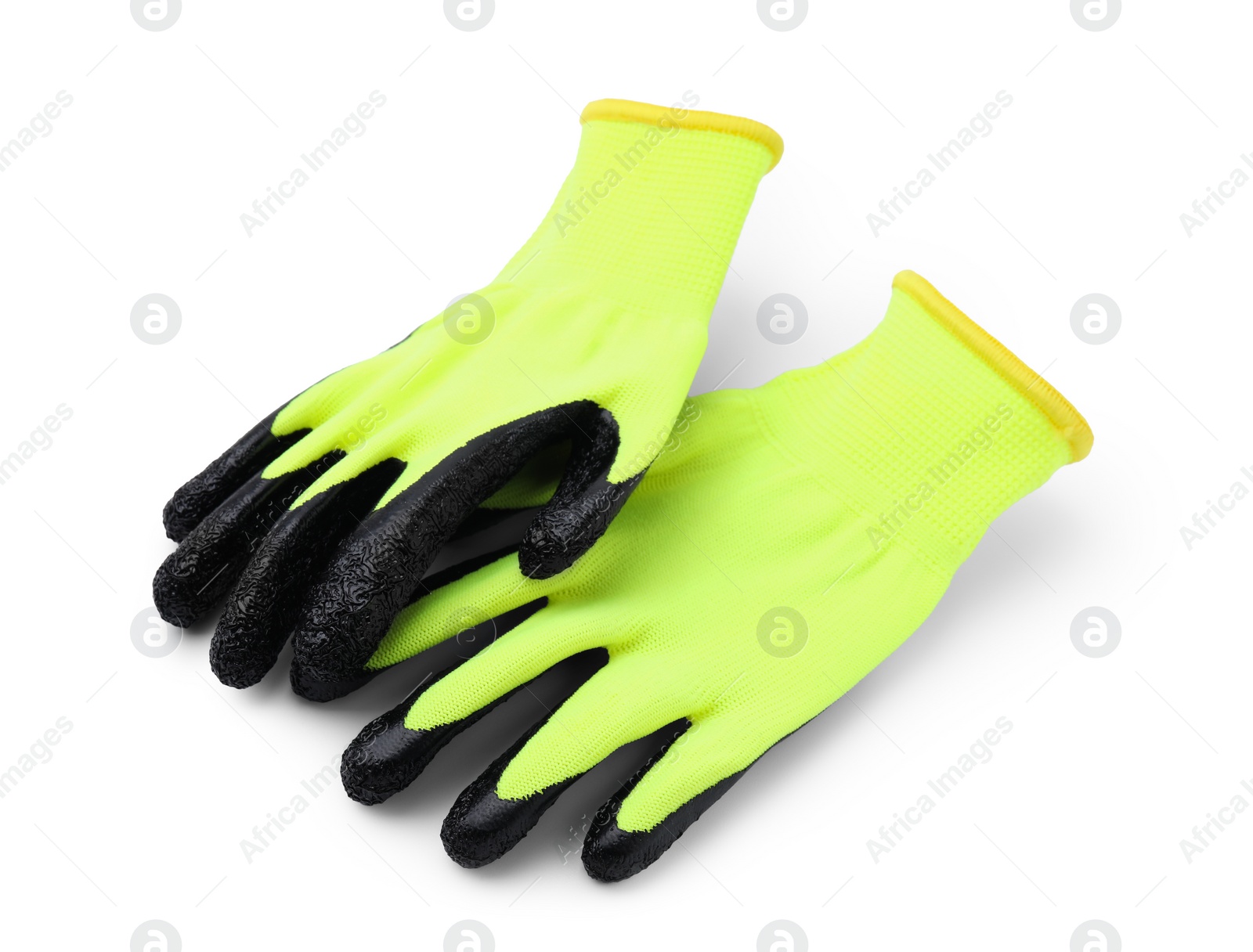 Photo of Pair of color gardening gloves isolated on white