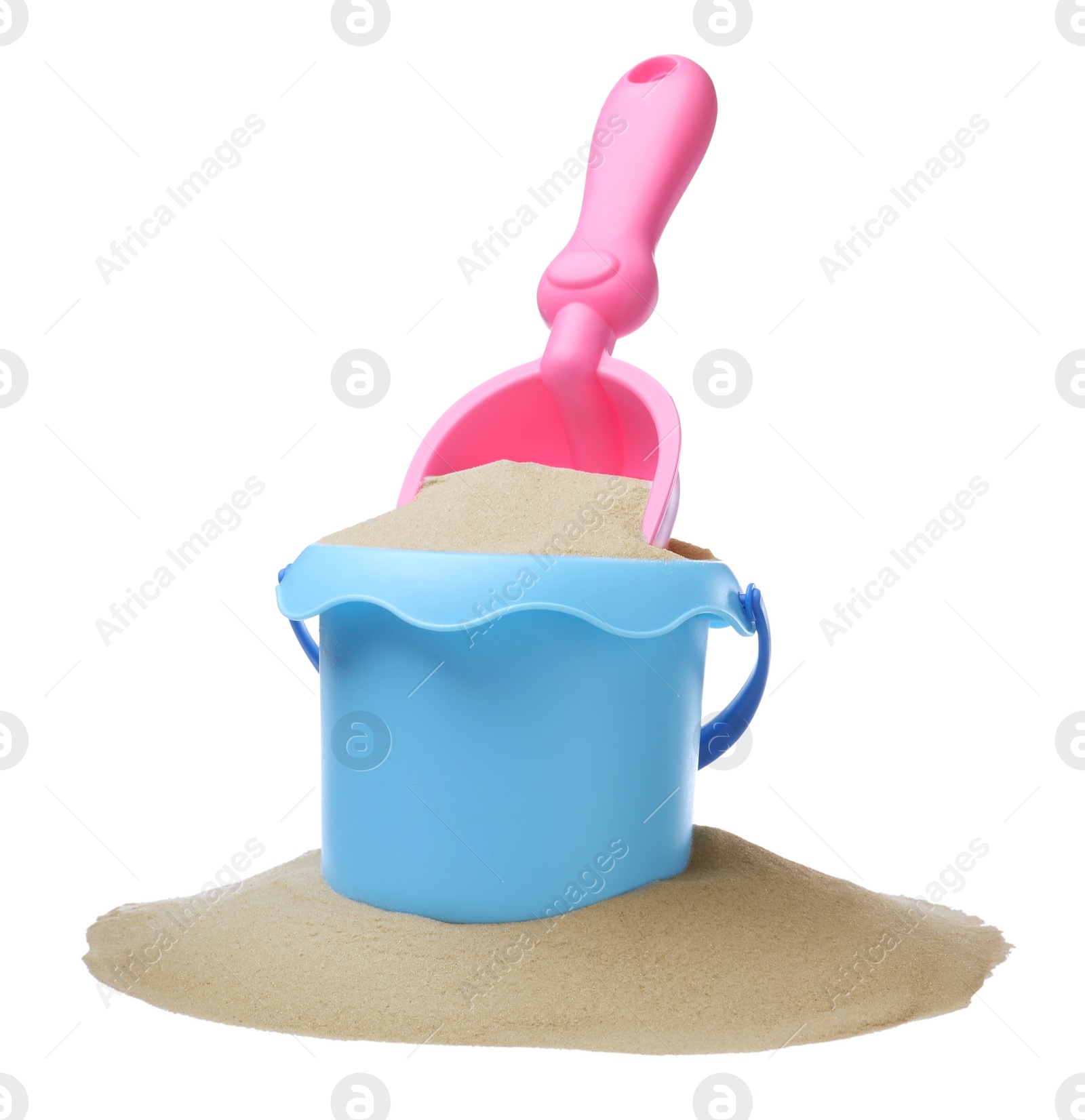 Photo of Plastic toy bucket with pink shovel and sand on white background