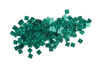 Photo of Pile of green sequins isolated on white, top view