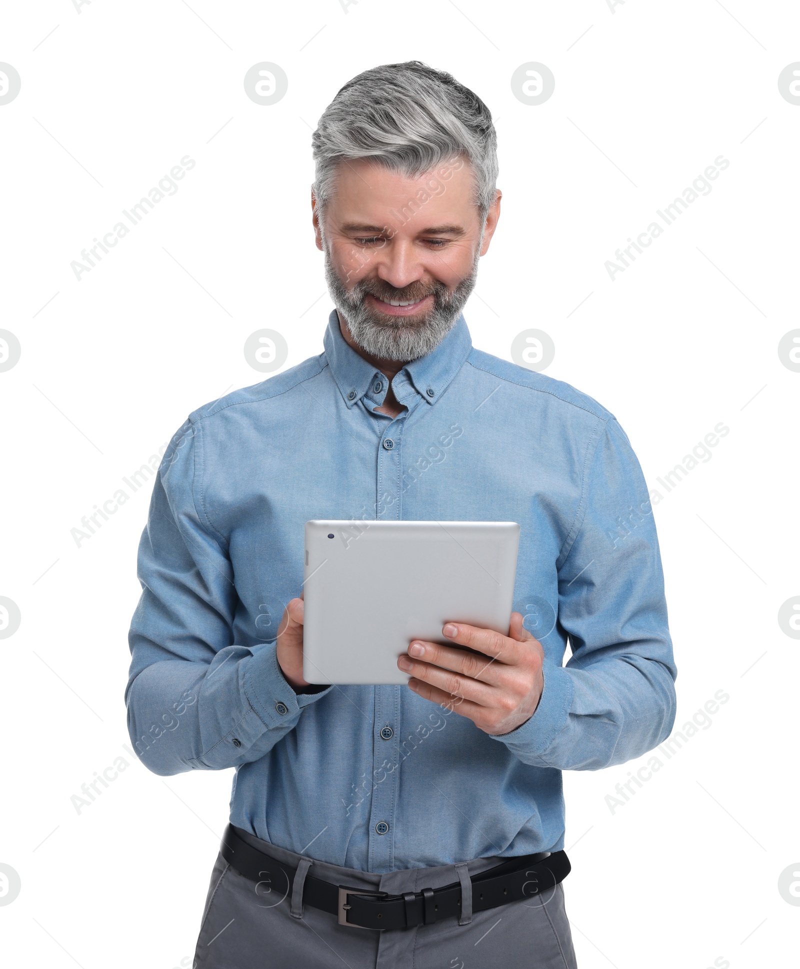 Photo of Mature businessman in stylish clothes with tablet on white background