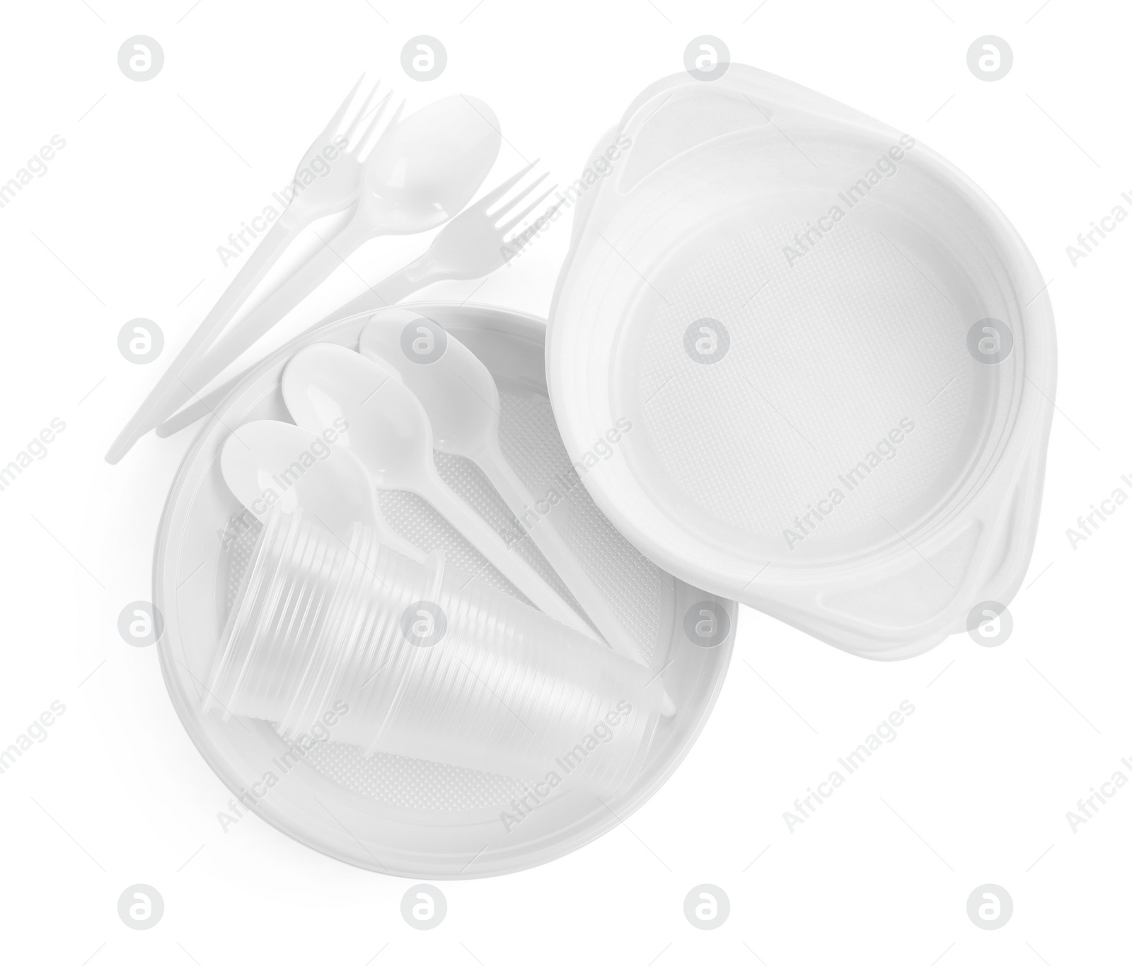 Photo of Set of disposable tableware on white background, top view