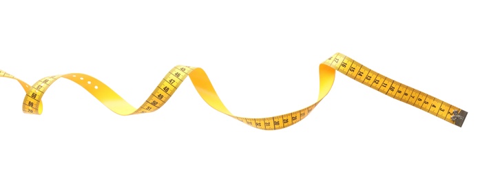 Photo of New yellow measuring tape isolated on white, top view