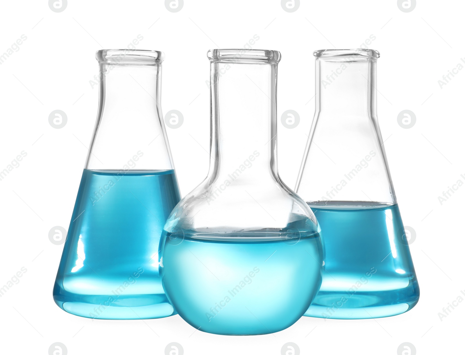 Photo of Glassware with liquids isolated on white. Laboratory analysis