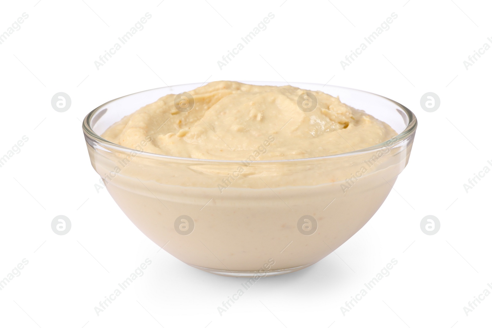 Photo of Bowl of tasty hummus isolated on white