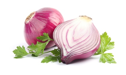 Photo of Ripe red onions and parsley on white background