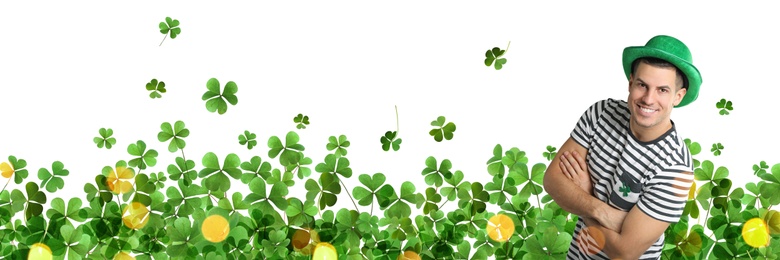 Image of Happy man in St. Patrick's Day outfit and clover leaves on white background, banner design