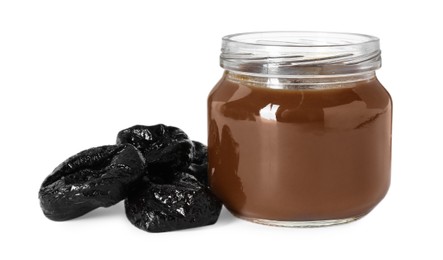 Photo of Jar of healthy baby food and dried prunes isolated on white