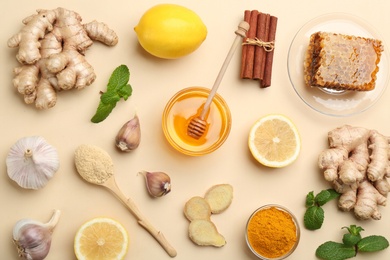 Photo of Flat lay composition with fresh products on beige background. Natural antibiotics