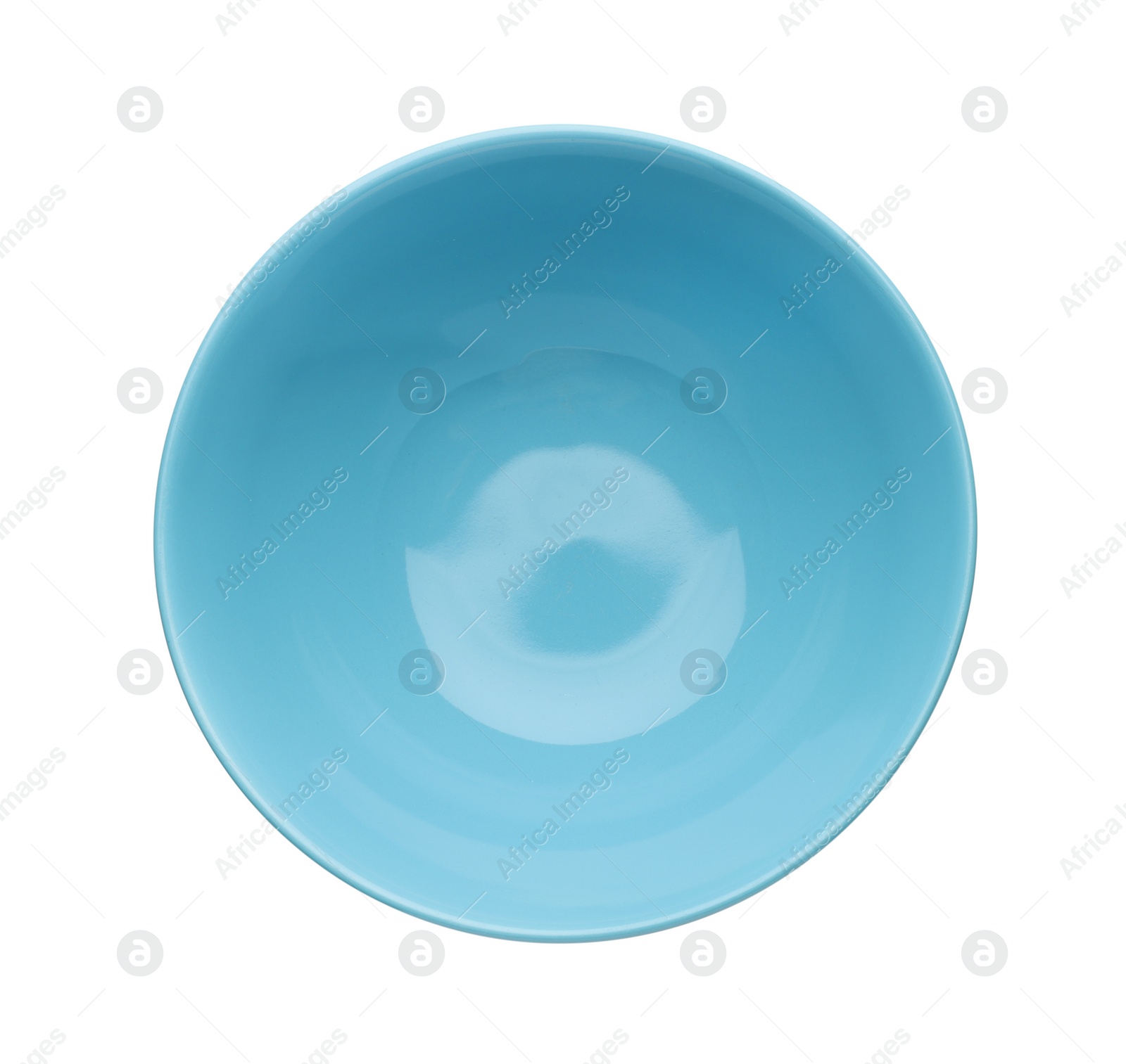 Photo of Empty blue ceramic bowl isolated on white, top view