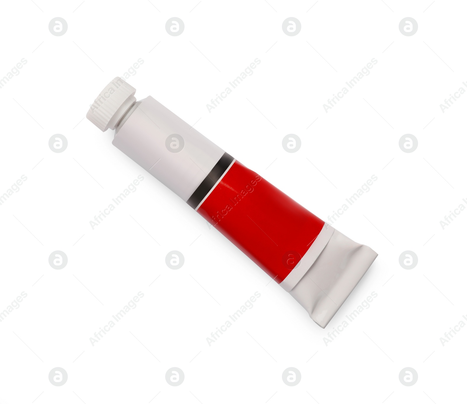 Photo of Tube with red oil paint on white background, top view