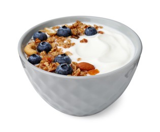 Photo of Bowl with yogurt, blueberries and granola isolated on white
