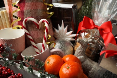 Stylish Christmas gift set with tangerines in crate