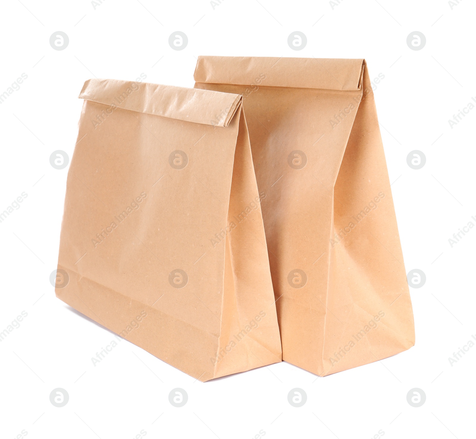 Photo of Paper bags isolated on white. Mockup for design