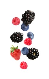 Image of Blackberries, blueberries, strawberry and raspberries falling on white background