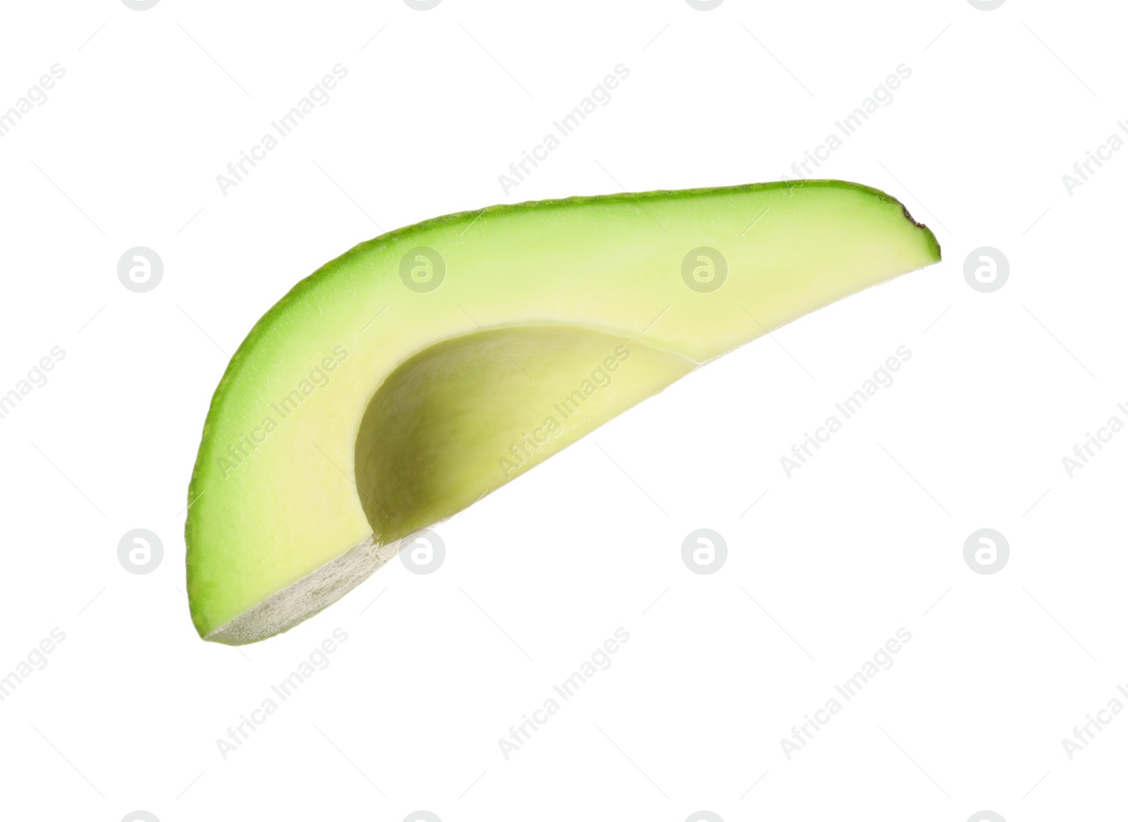 Photo of Slice of ripe avocado isolated on white