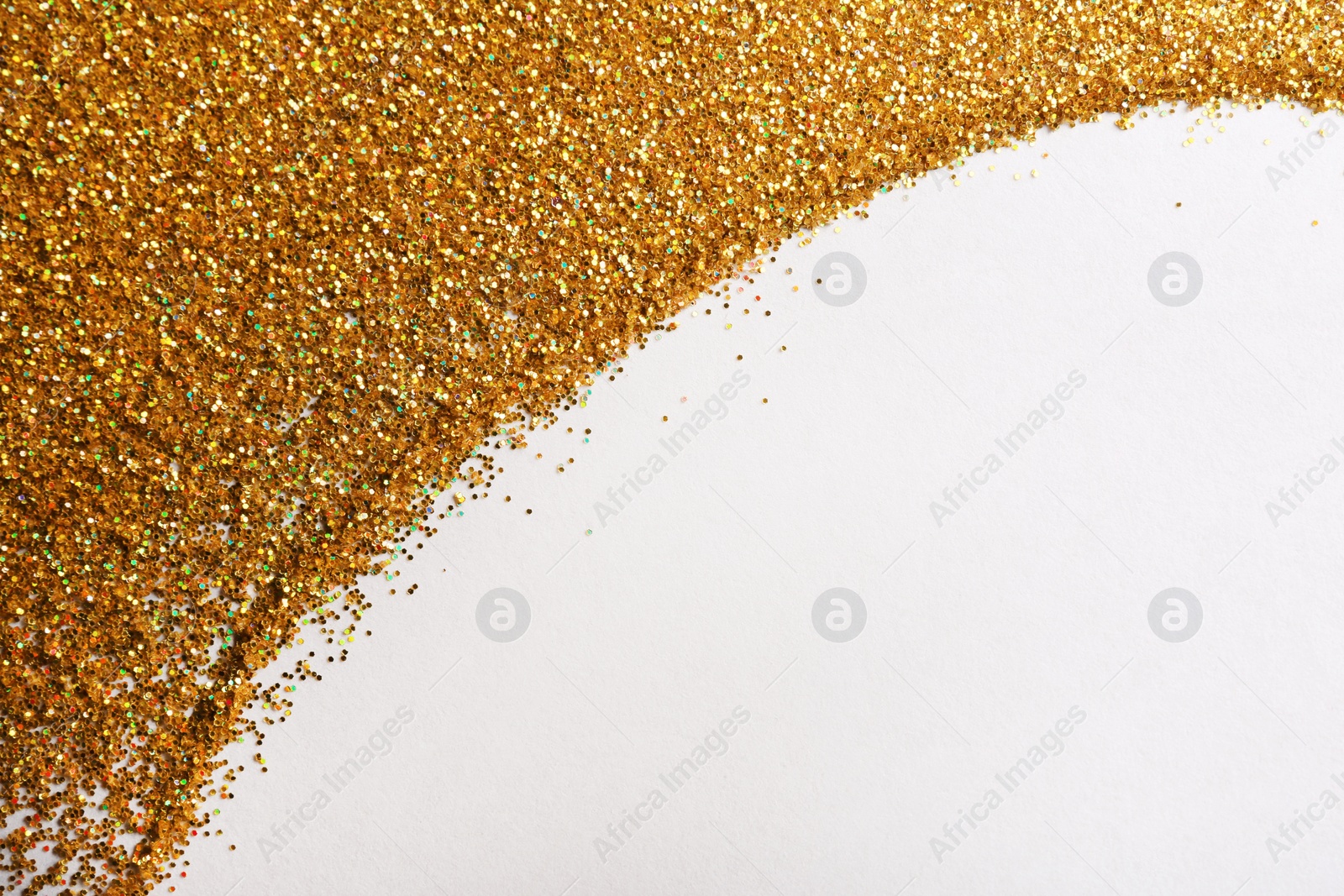 Photo of Frame made of golden glitter on white background, top view