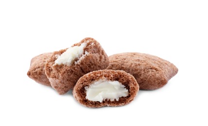 Chocolate corn pads with milk filling on white background