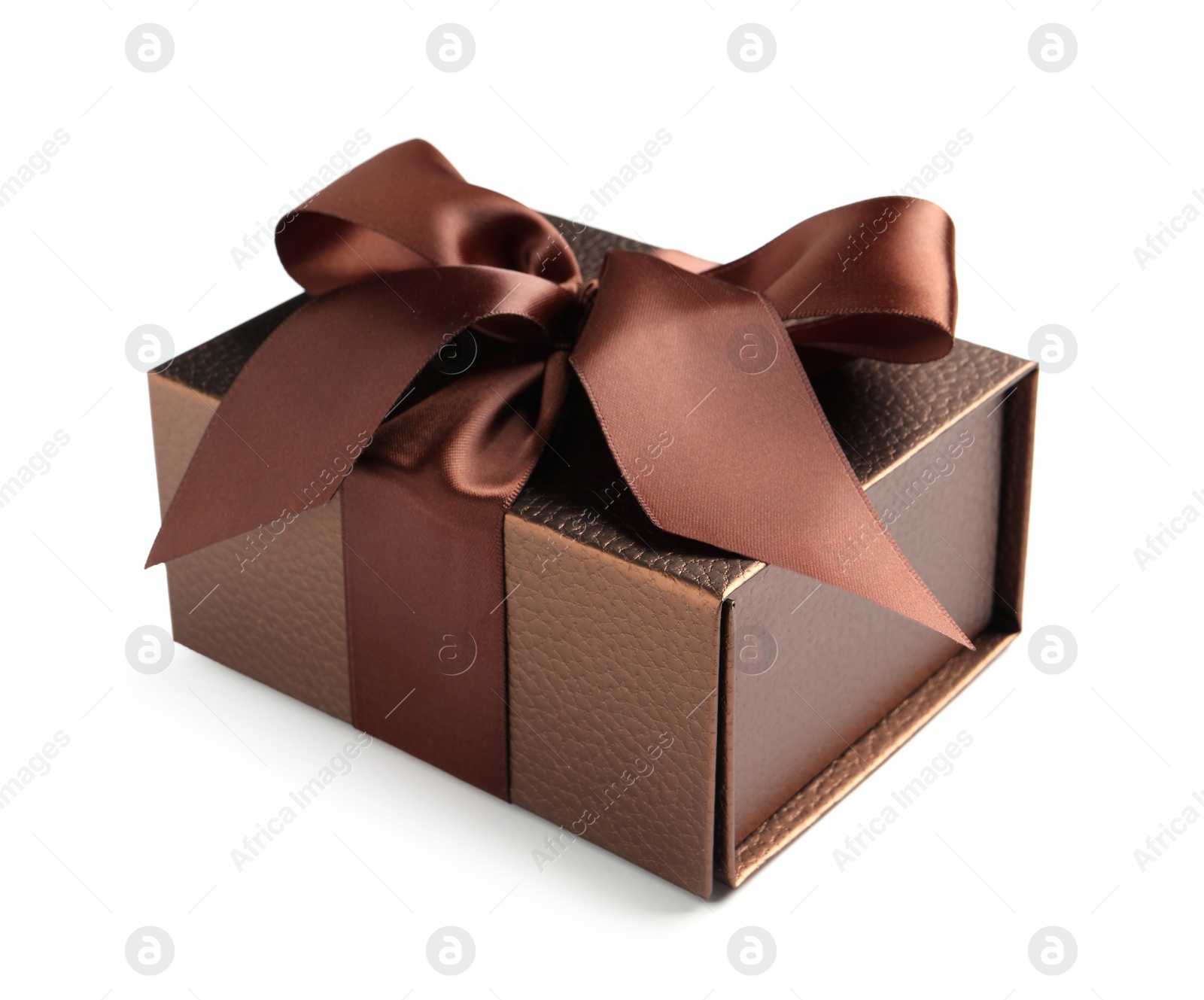 Photo of Brown gift box decorated with satin ribbon and bow on white background