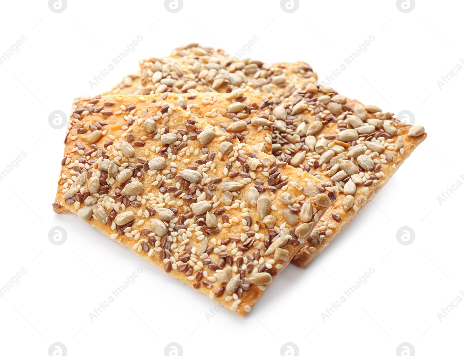 Photo of Delicious crispy crackers with different seeds isolated on white