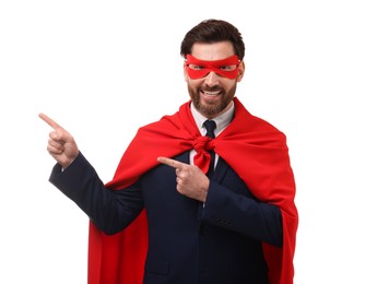 Photo of Happy businessman wearing red superhero cape and mask on white background