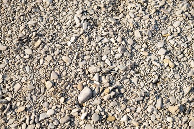 Ground covered with stones and pebbles as background