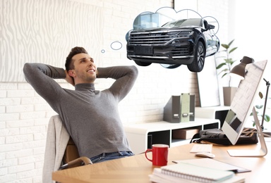 Image of Man dreaming about new car in office during break