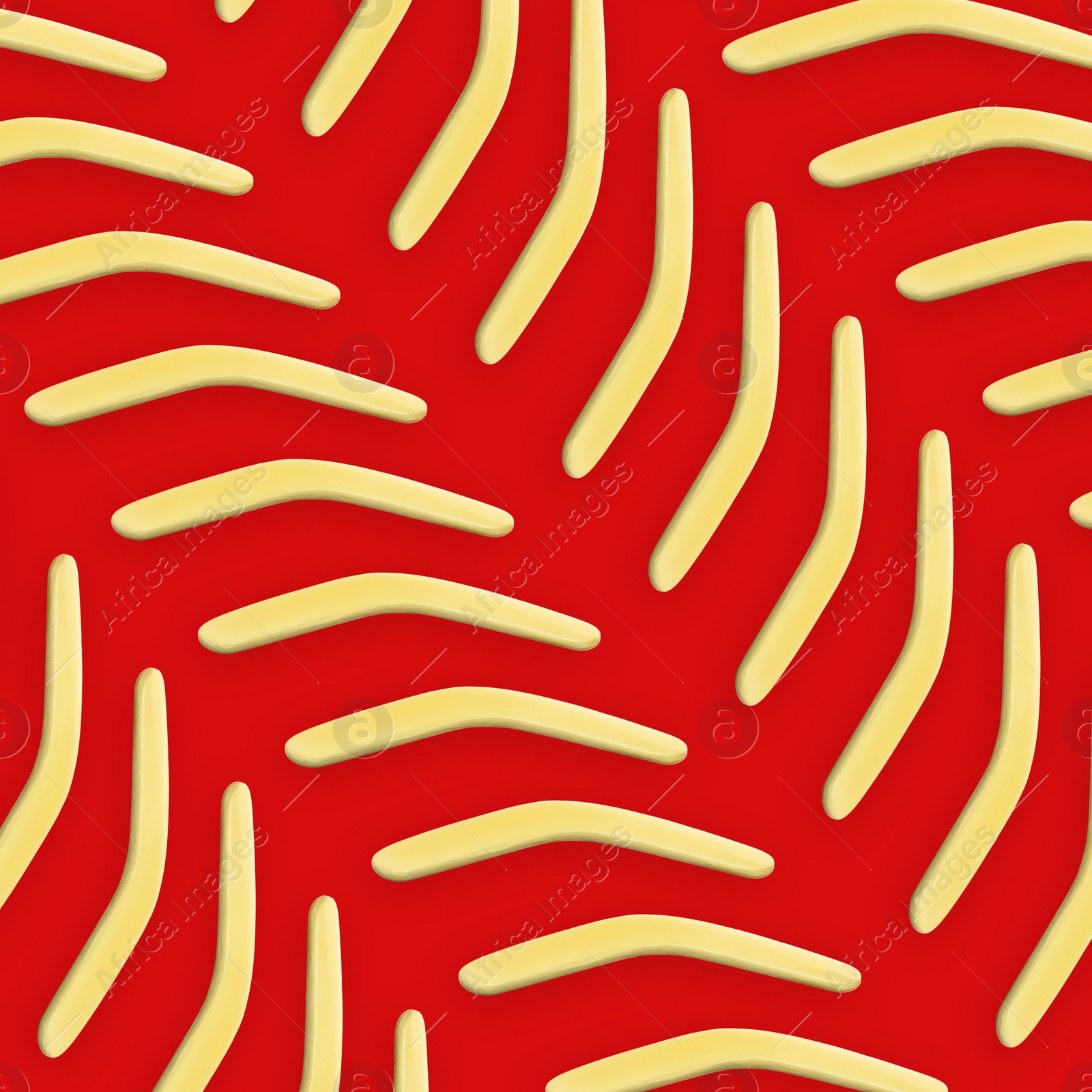 Image of Yellow boomerangs on red background, flat lay