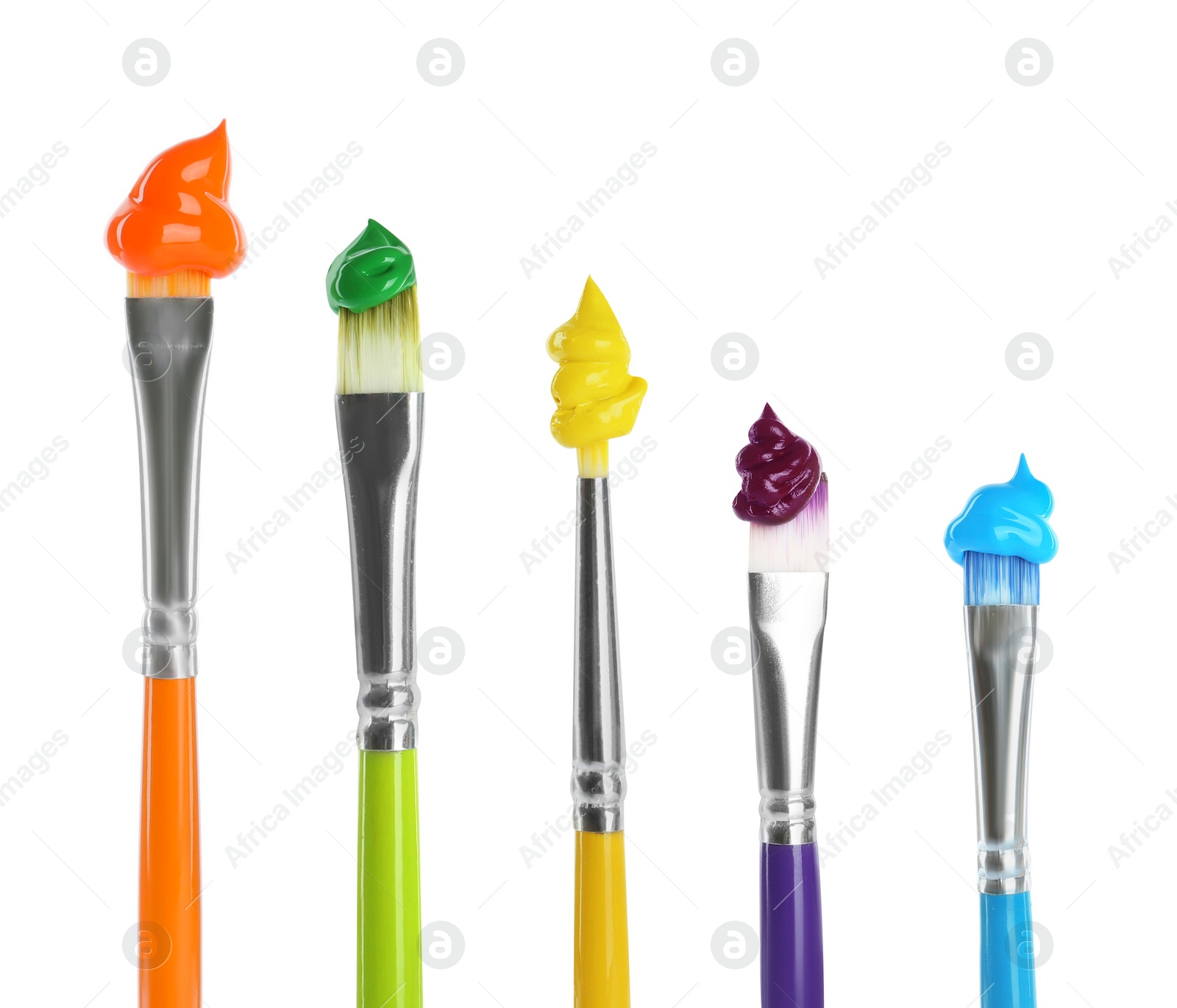 Image of Set of different brushes with paints on white background