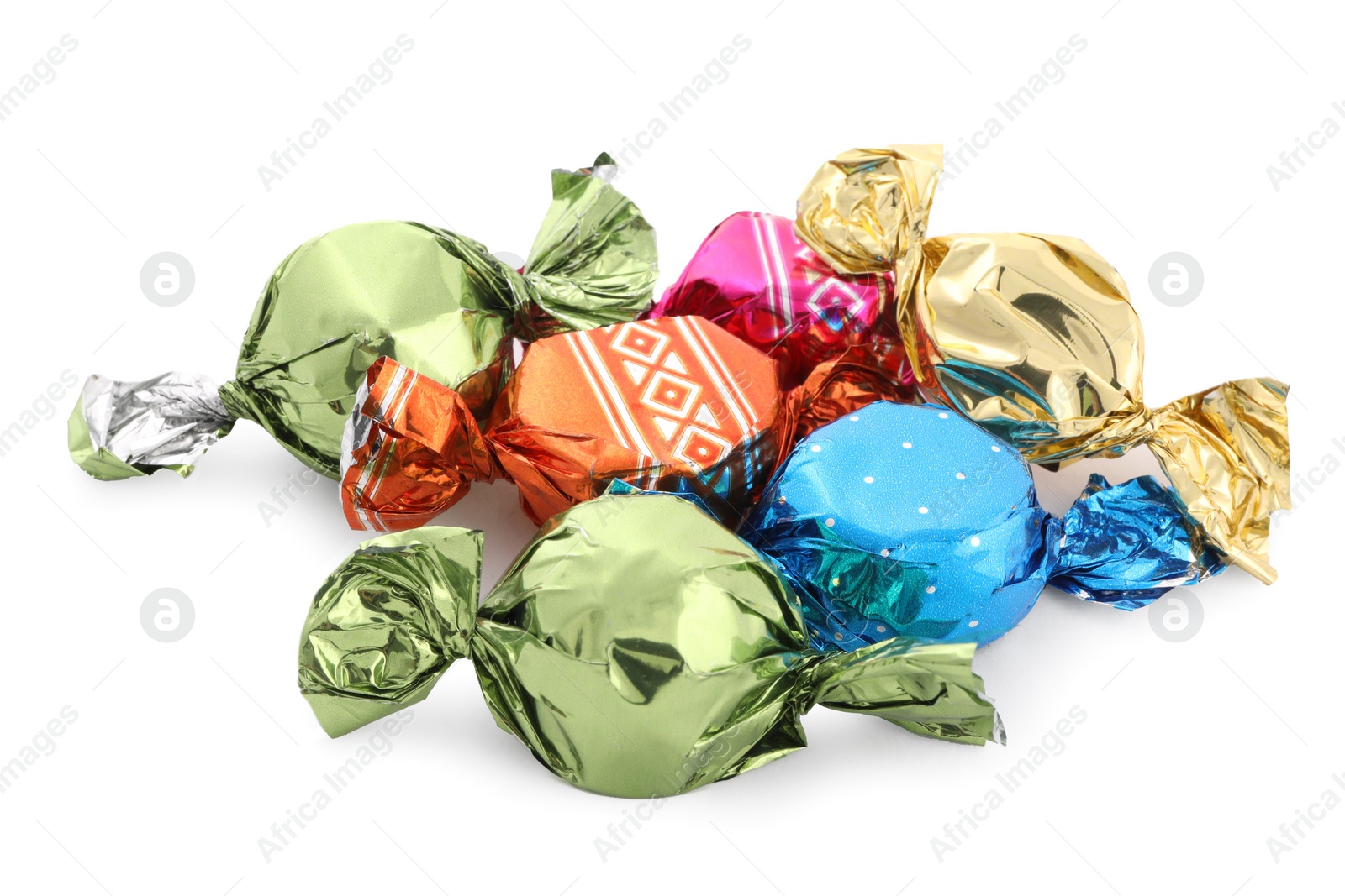 Photo of Sweet candies in colorful wrappers on white background